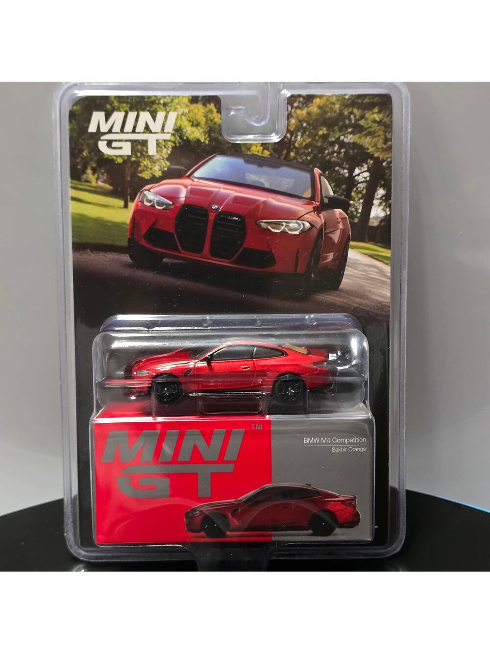 BMW M4 Competition G82 Sakhir Orange Mini GT #811 1:64